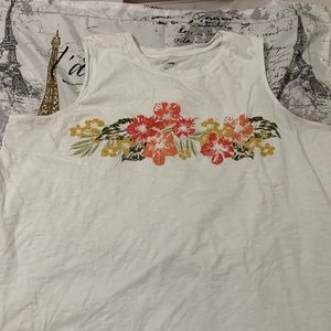 White tank top with flowers.